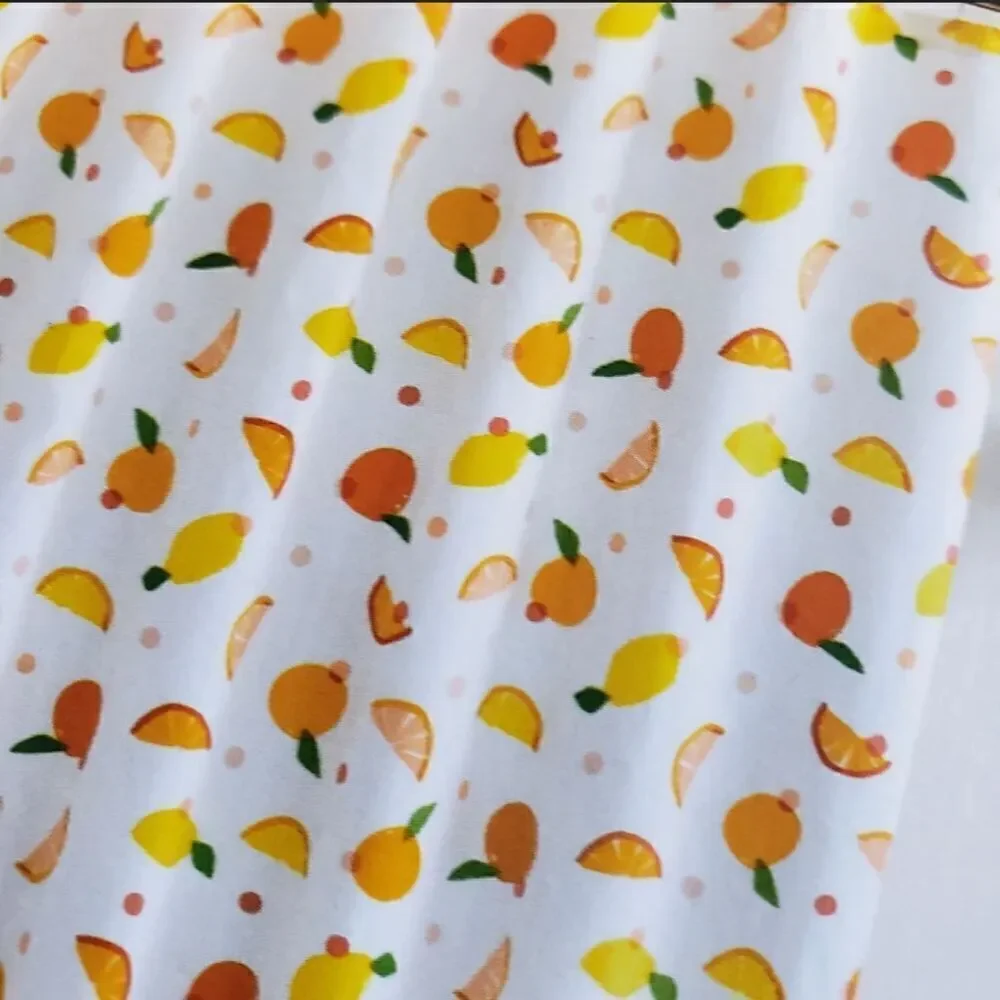 The Kate Spade Citrus Dot Shower Curtains